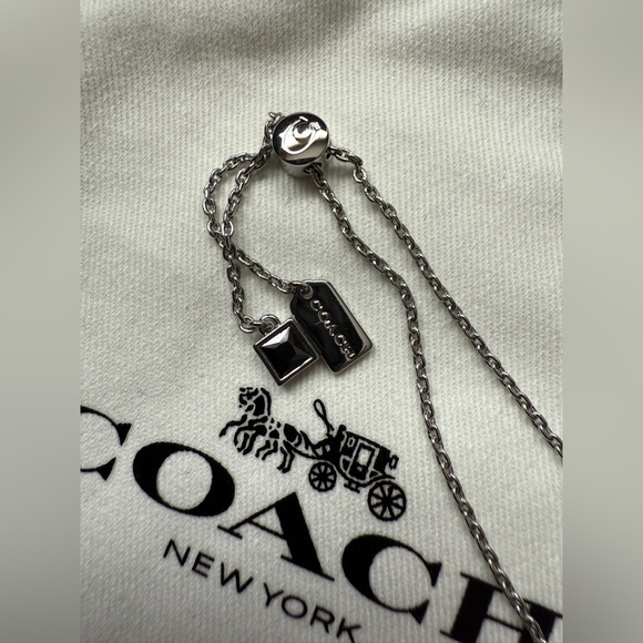 NEW‼️ COACH SIGNATURE “C” CRYSTAL SILVER SLIDER BRACELET - Picture 10 of 13